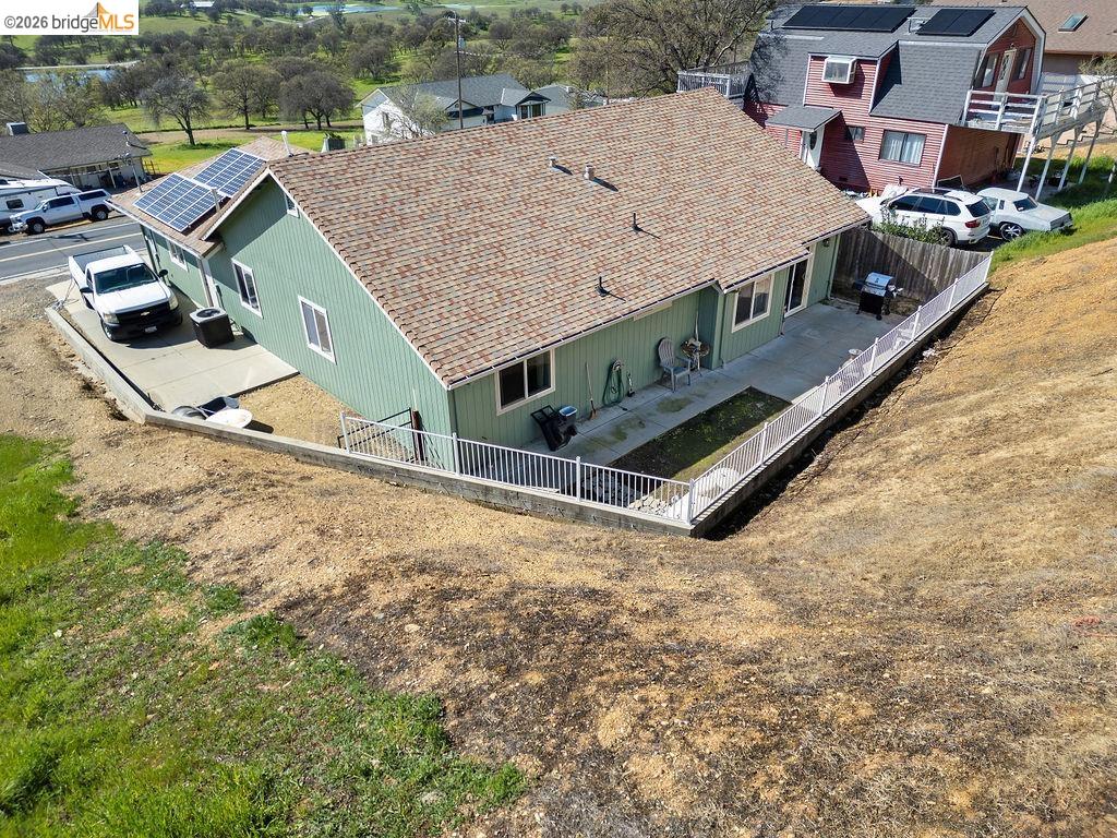 4955 Little John Road Copperopolis, CA 95228 - Photo 34 of 60 an aerial view of residential houses with outdoor space and parking