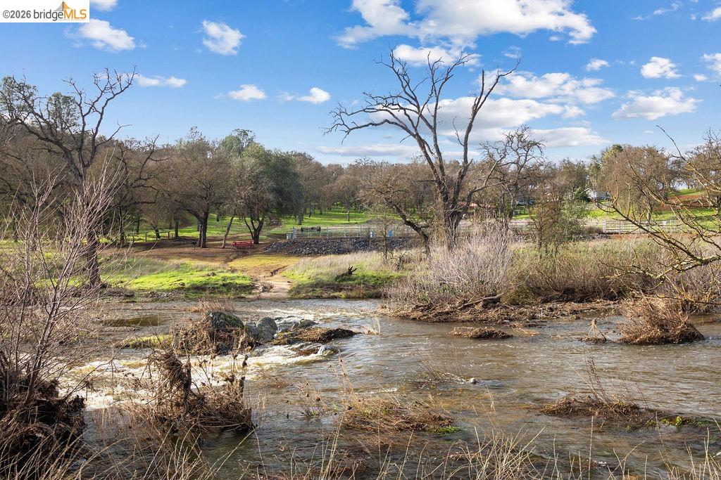 4955 Little John Road Copperopolis, CA 95228 - Photo 36 of 60 a view of a backyard of the house