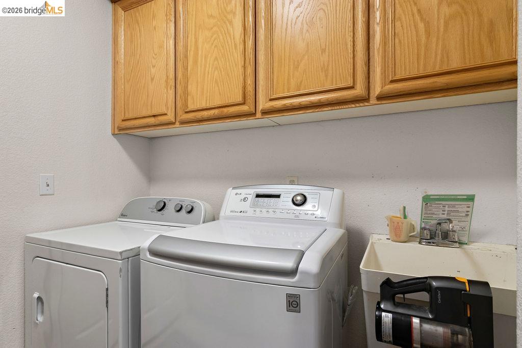 4955 Little John Road Copperopolis, CA 95228 - Photo 53 of 60 a utility room with dryer and washer