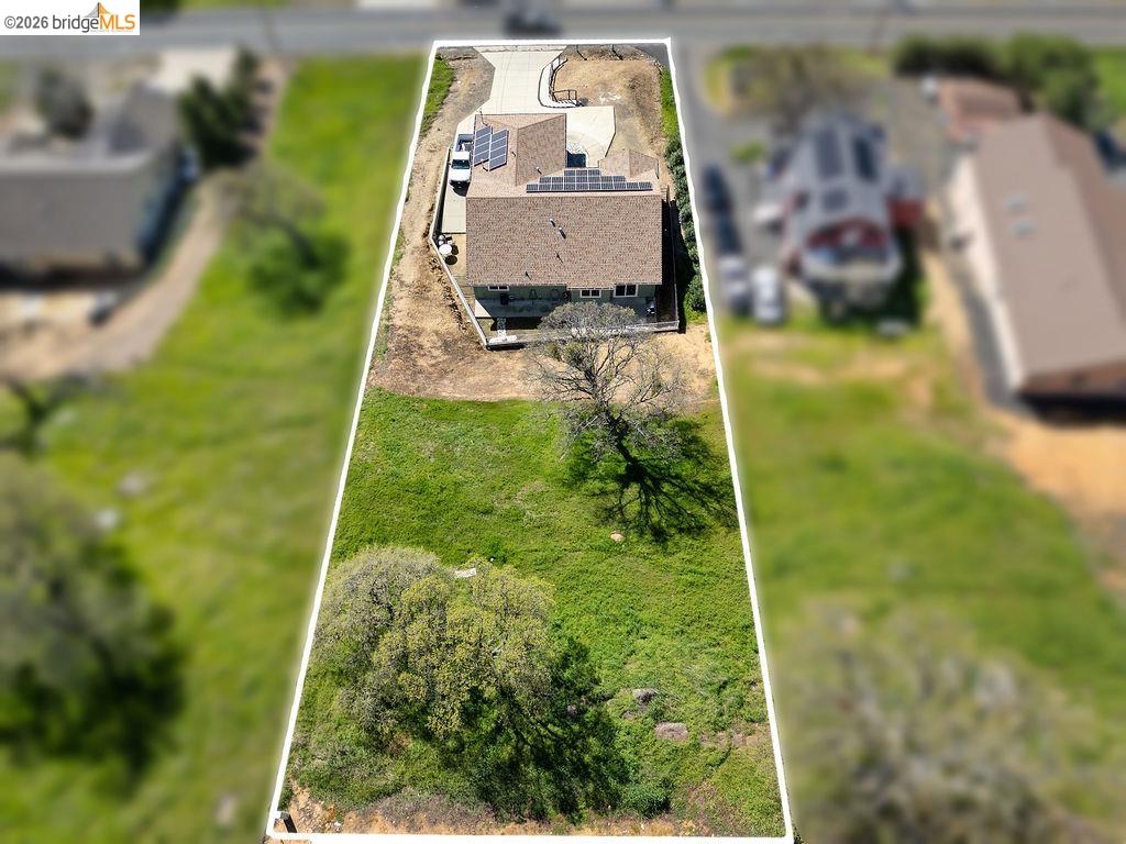 4955 Little John Road Copperopolis, CA 95228 - Photo 4 of 60 Aerial perspective of suburban area featuring property parcel outlined