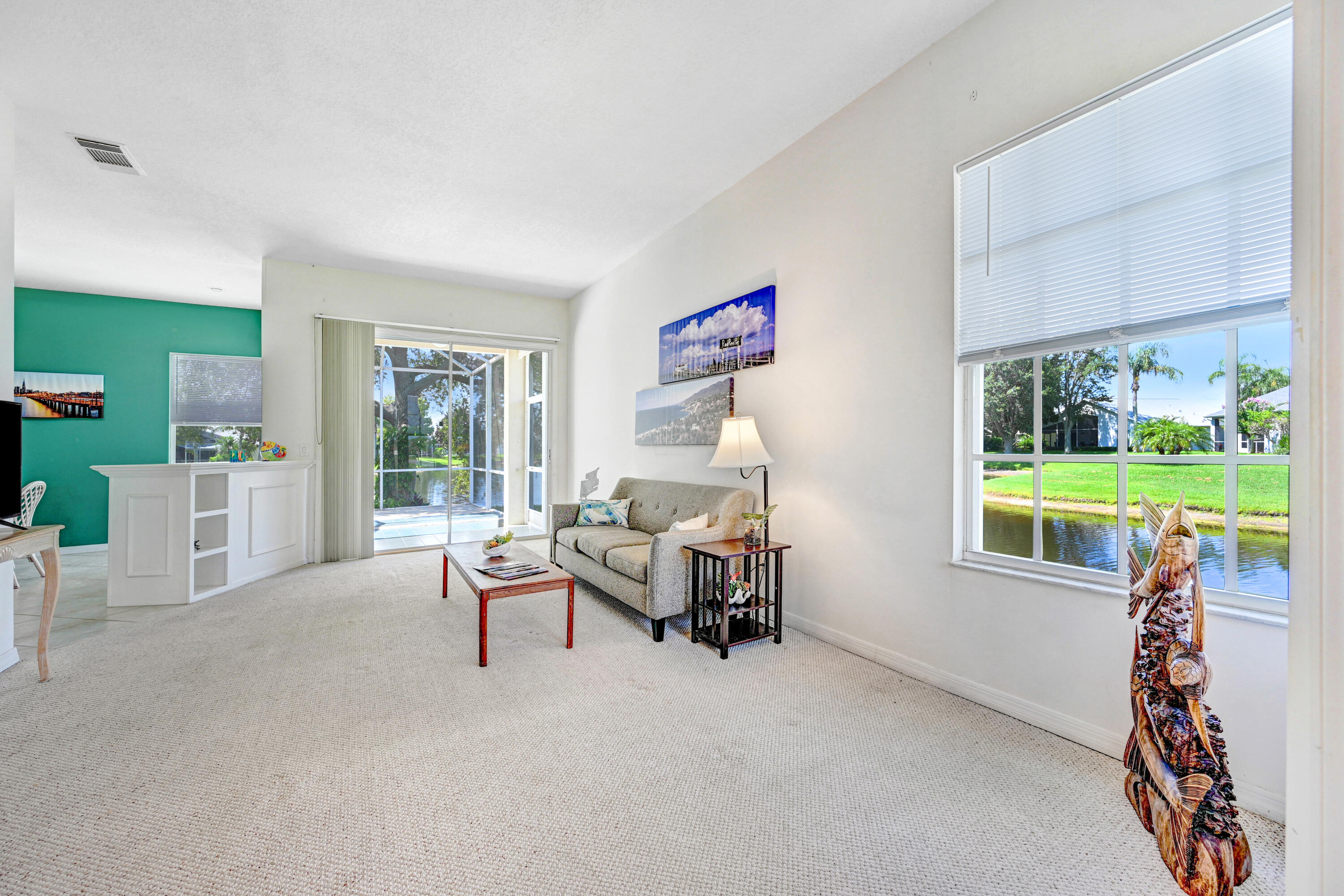 2299 Addington Circle Rockledge, FL 32955 - Photo 14 of 61 a living room with furniture and a large window