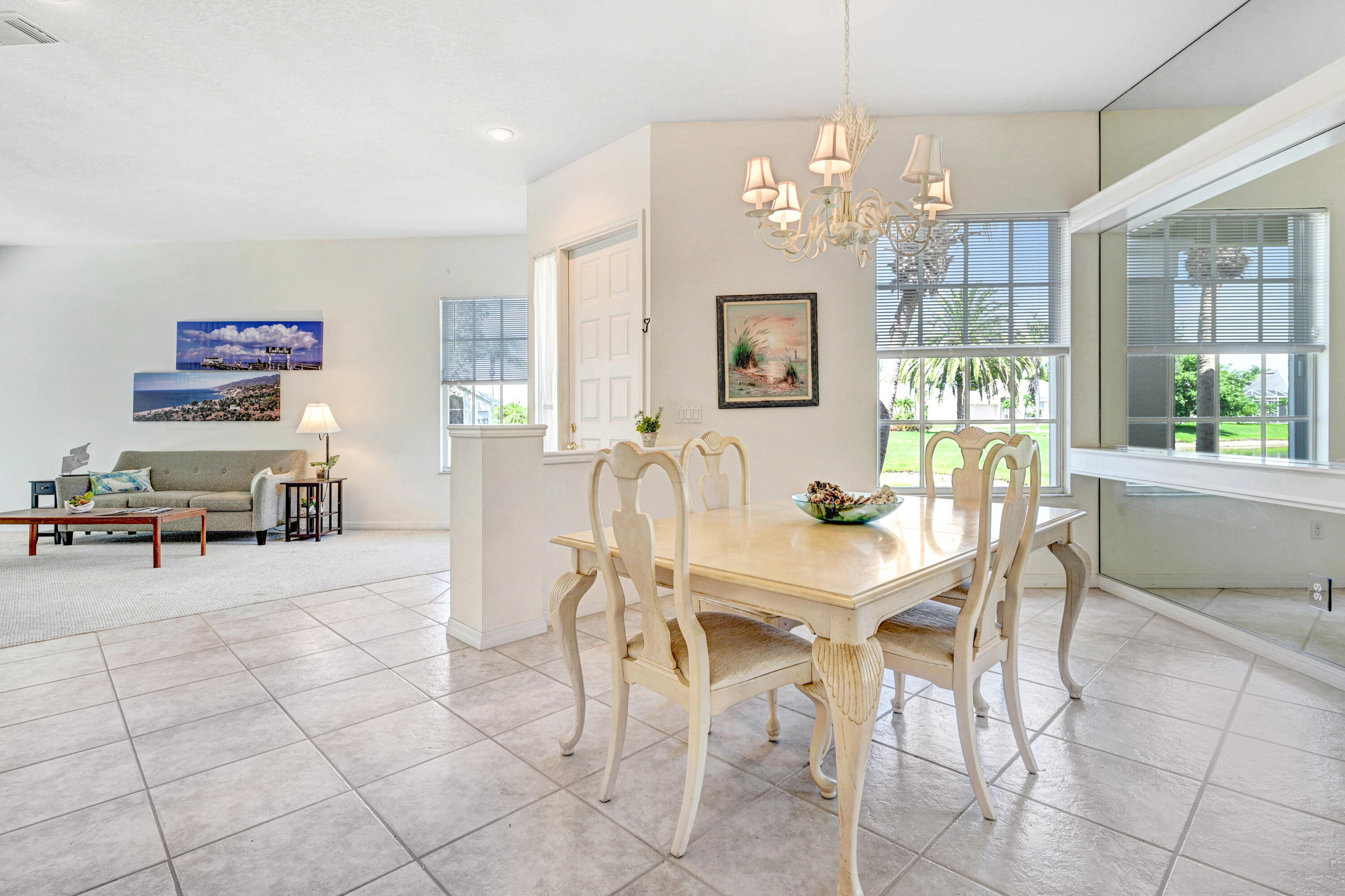 2299 Addington Circle Rockledge, FL 32955 - Photo 15 of 61 a view of a dining room with furniture window and outside view