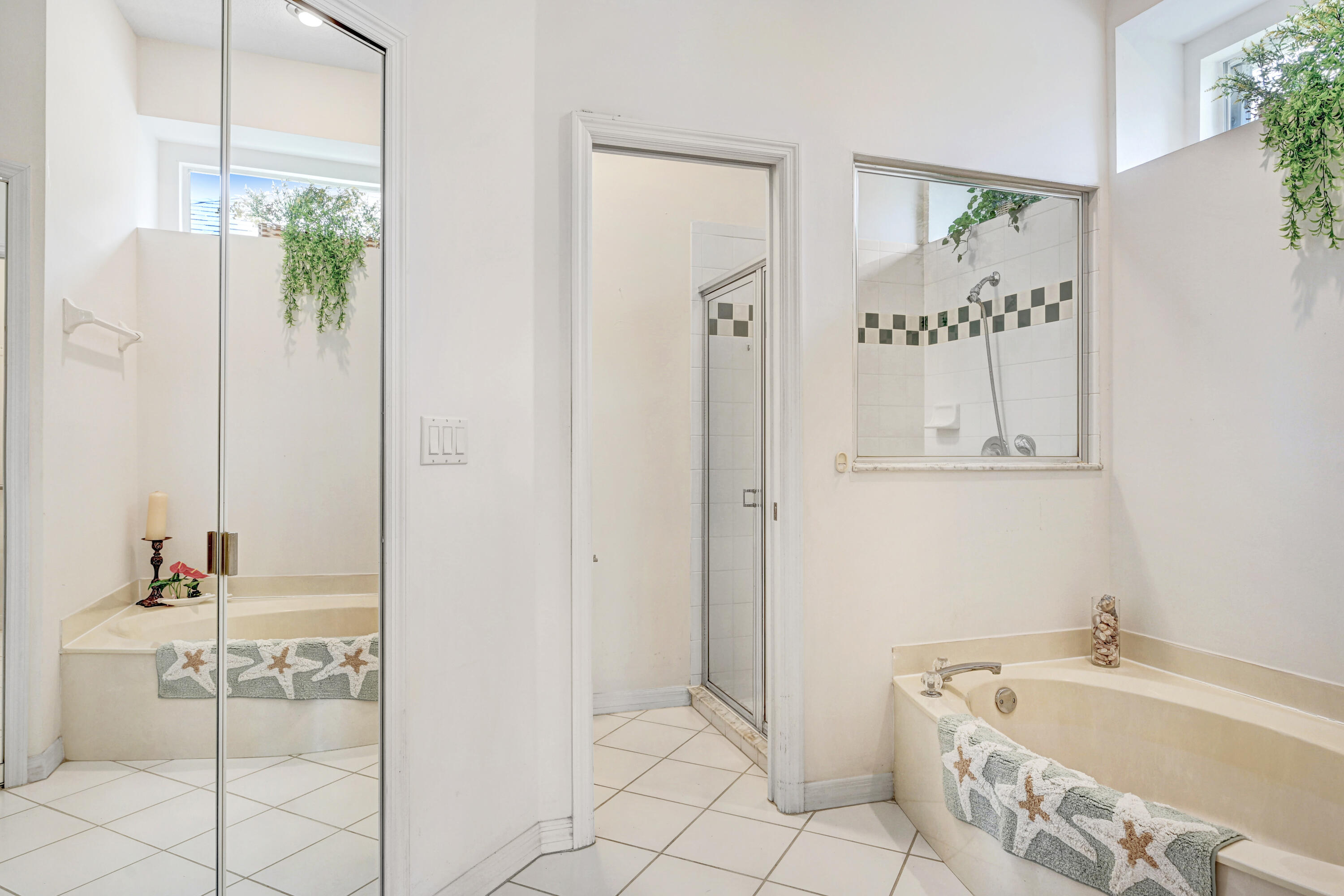 2299 Addington Circle Rockledge, FL 32955 - Photo 31 of 61 a bathroom with a tub a sink and a shower