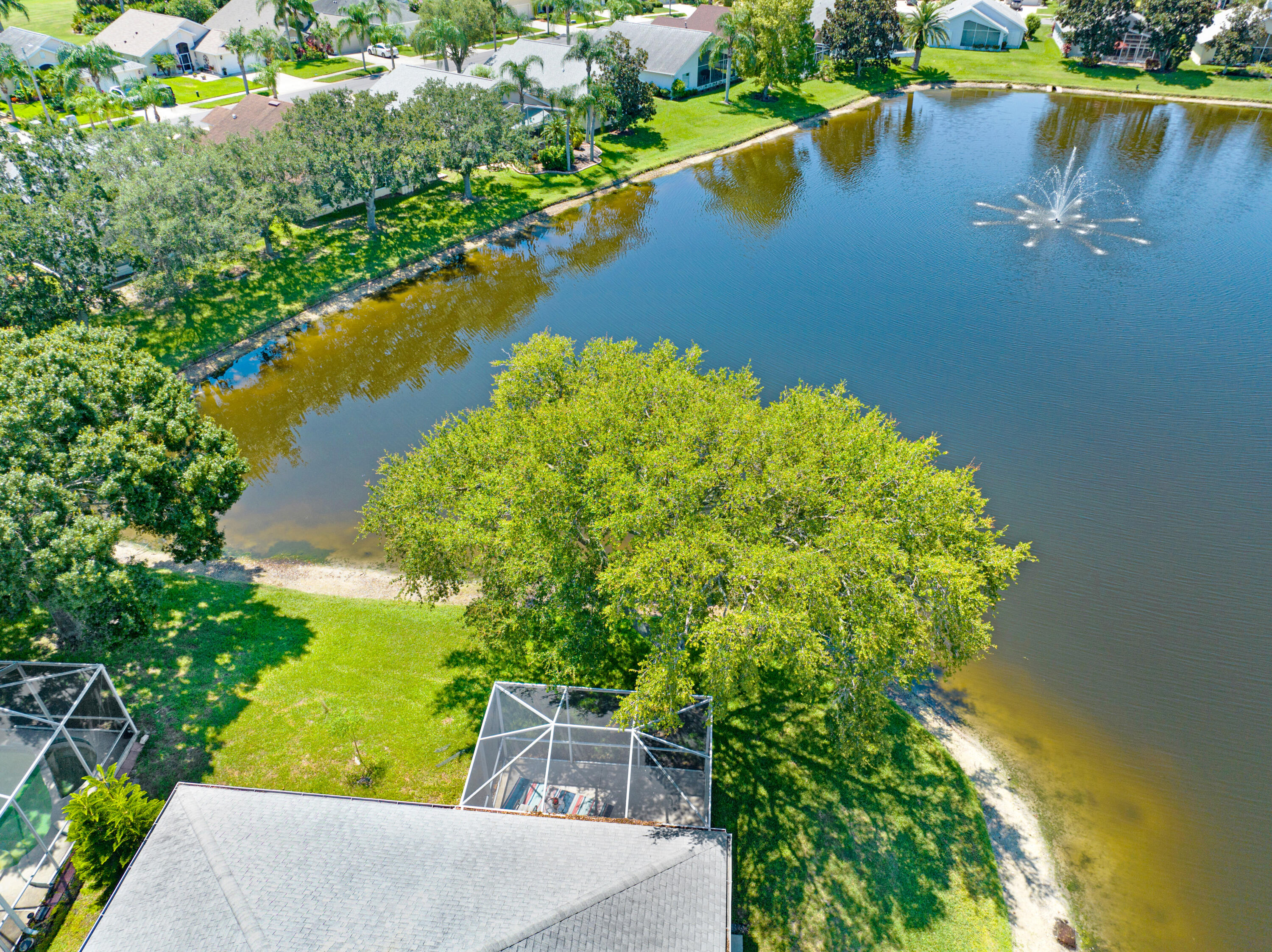 2299 Addington Circle Rockledge, FL 32955 - Photo 41 of 61 an aerial view of a house with a lake view