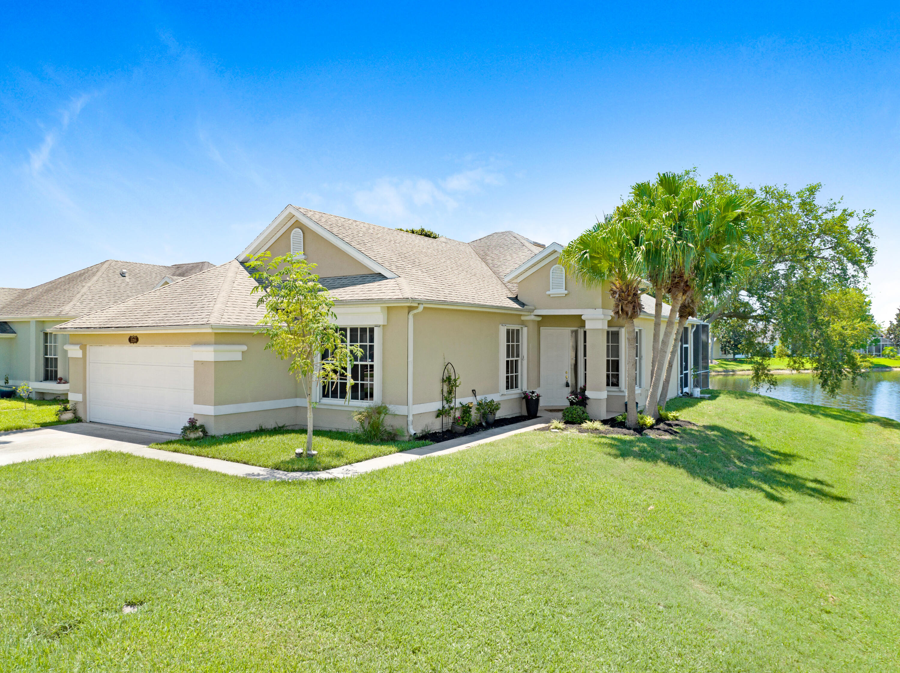 2299 Addington Circle Rockledge, FL 32955 - Photo 54 of 61 a view of a house with a yard and sitting area