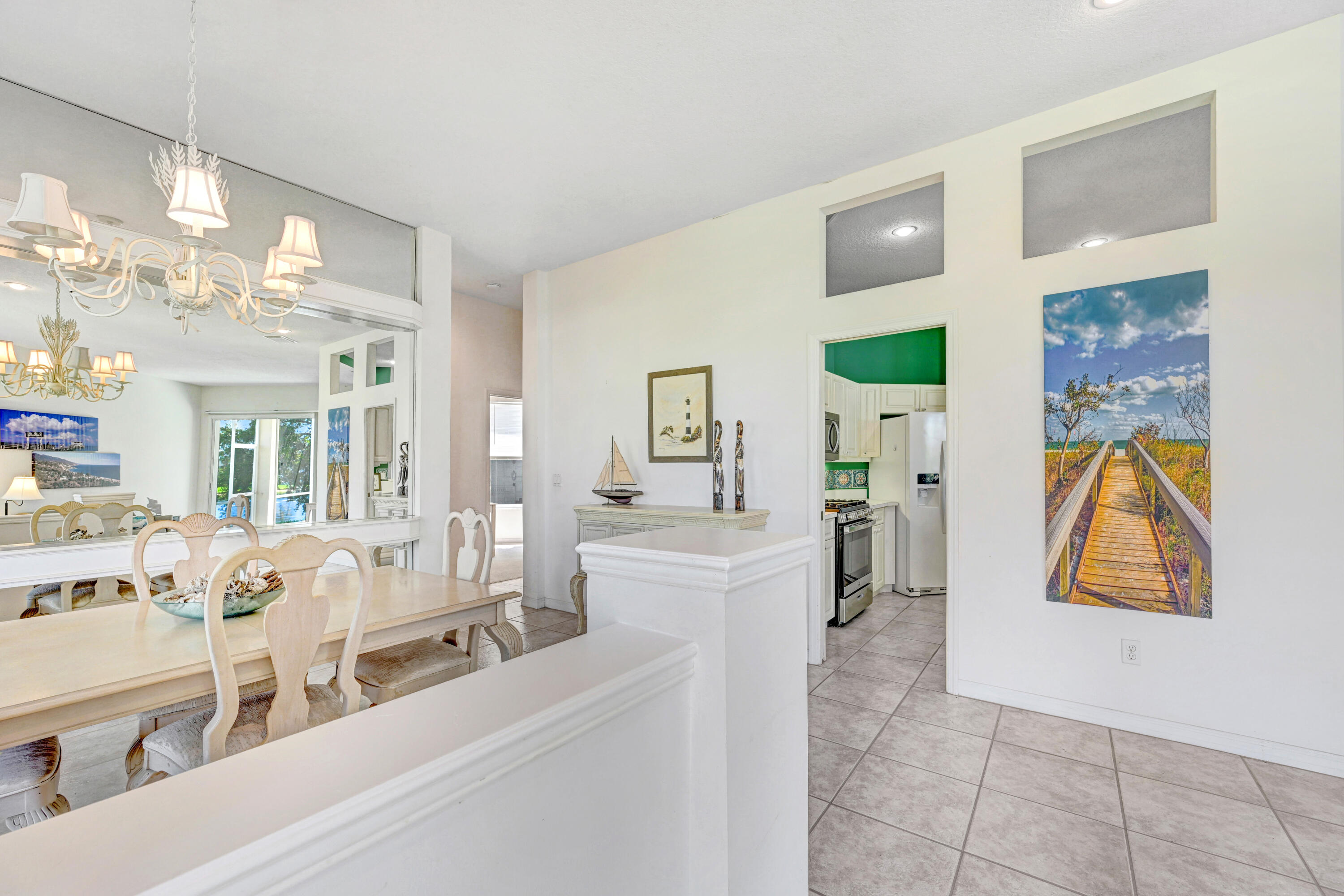 2299 Addington Circle Rockledge, FL 32955 - Photo 7 of 61 a living room with furniture and a chandelier