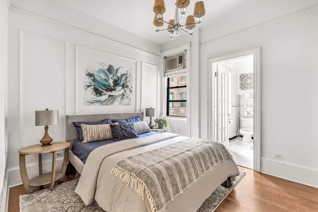 a kitchen with stainless steel appliances granite countertop a refrigerator sink and stove