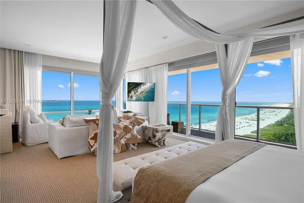 a view of an ocean and a yard