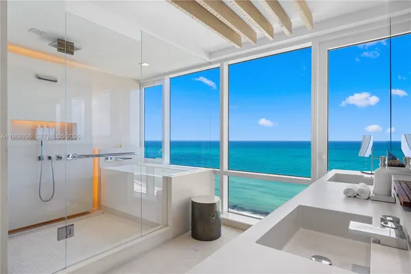 a view of a city with an ocean view