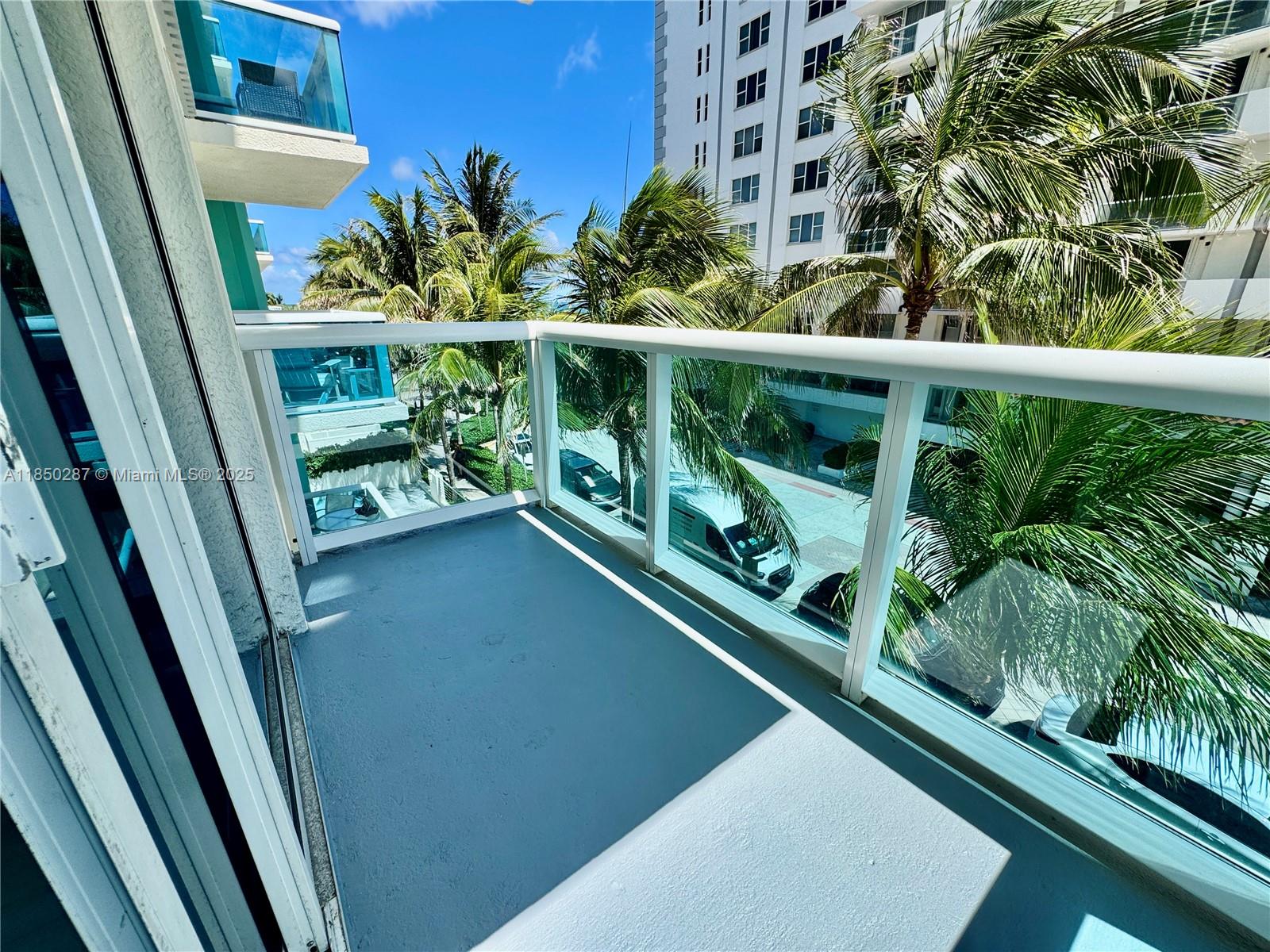 9201 Collins Avenue, Unit 323 Surfside, FL 33154 - Photo 12 of 46 a view of balcony with small garden