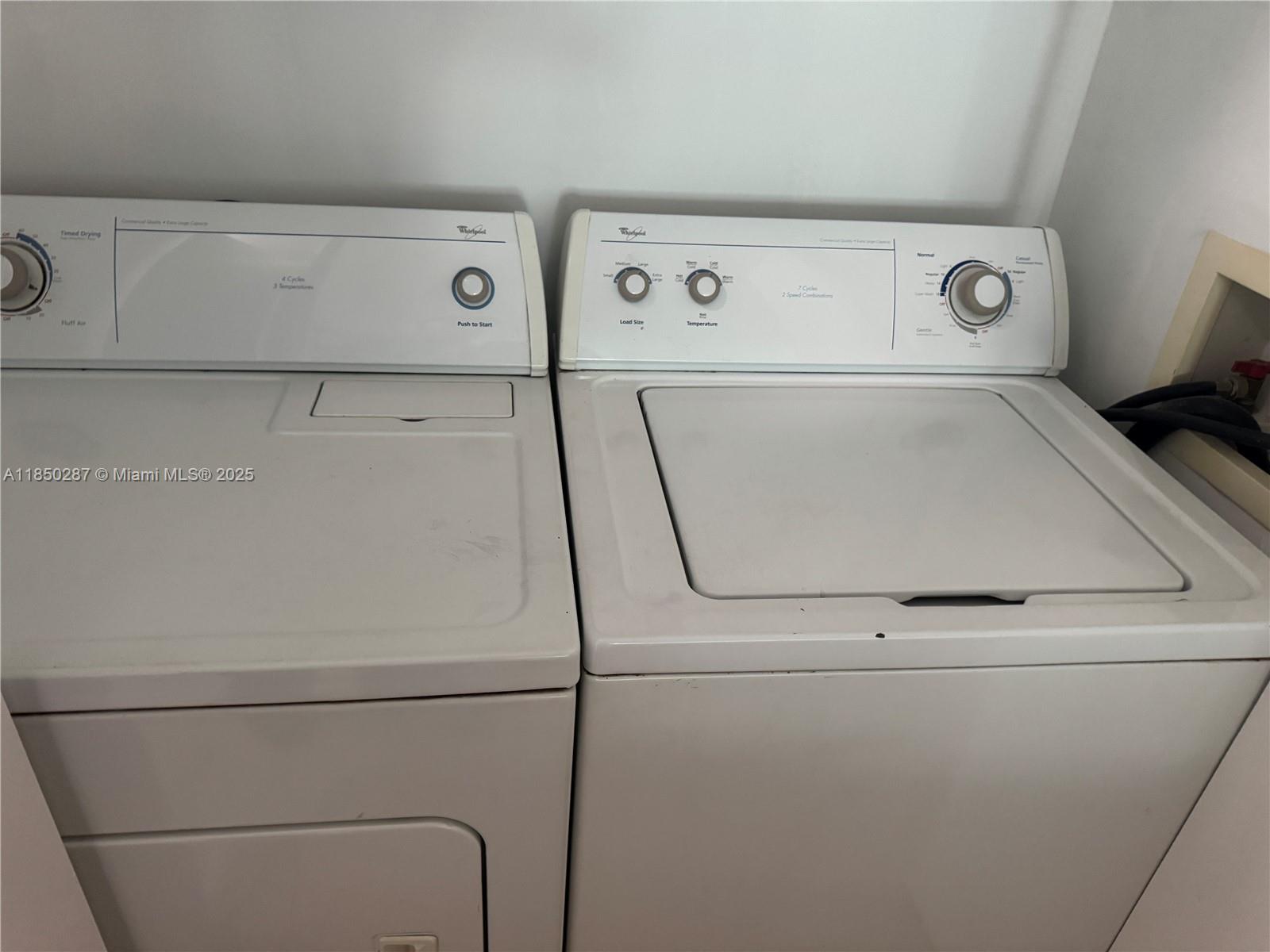 9201 Collins Avenue, Unit 323 Surfside, FL 33154 - Photo 26 of 46 a close up view of washer and dryer