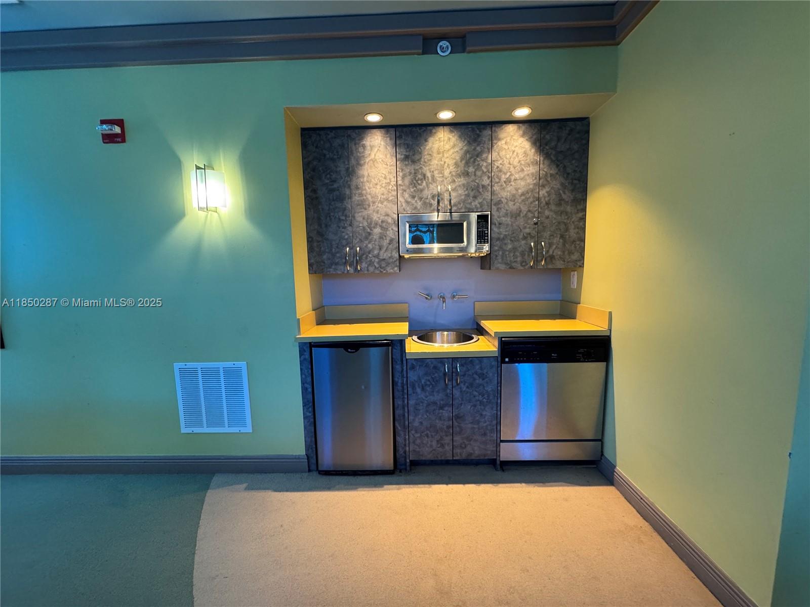 9201 Collins Avenue, Unit 323 Surfside, FL 33154 - Photo 30 of 46 a room with chairs