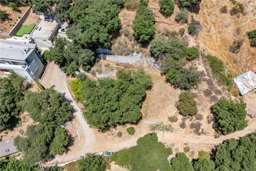 3577 Shaw Ranch Road Pasadena, CA 91107 - Photo 9 of 24 an aerial view of a house with a yard and covered with swimming pool