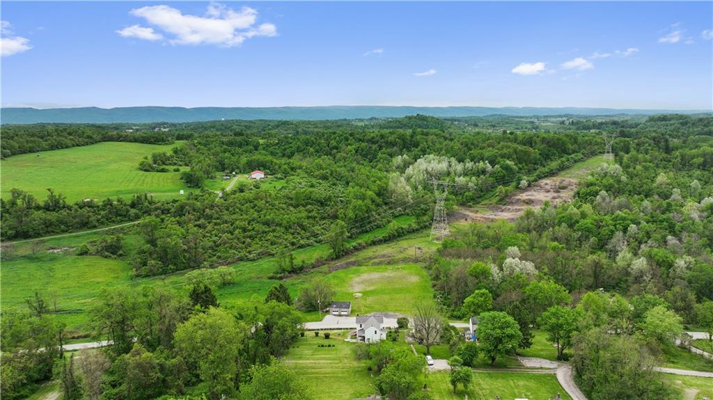 373 Searight Herbert Road Uniontown, PA 15401 - Photo 14 of 40 a view of a city with lush green forest