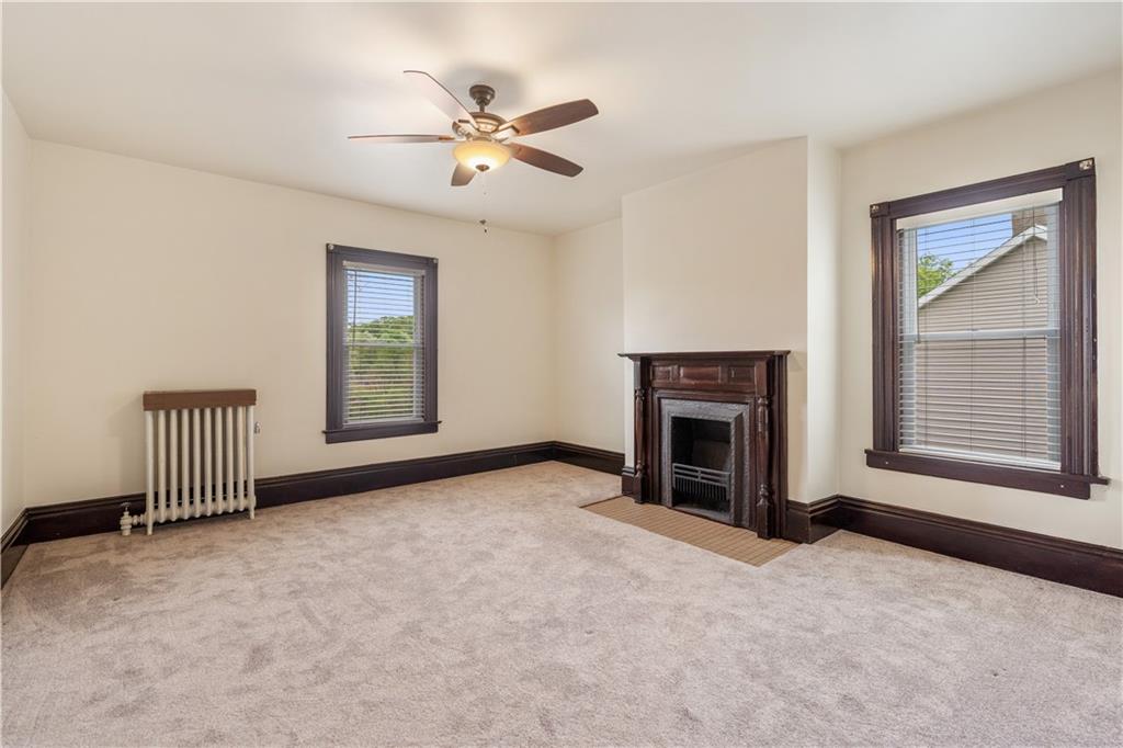 373 Searight Herbert Road Uniontown, PA 15401 - Photo 31 of 40 a view of a livingroom with a fireplace and window