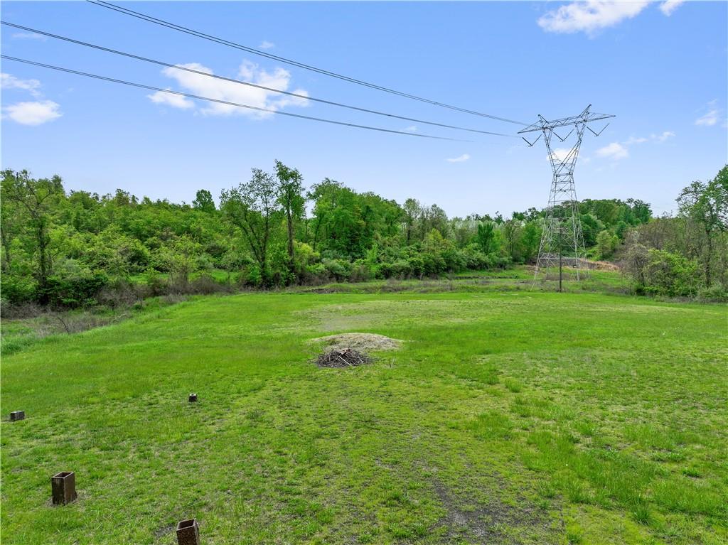 373 Searight Herbert Road Uniontown, PA 15401 - Photo 8 of 40 a view of a big yard with a large tree