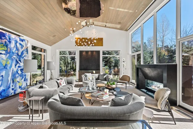 a kitchen with stainless steel appliances granite countertop a stove a refrigerator and a oven