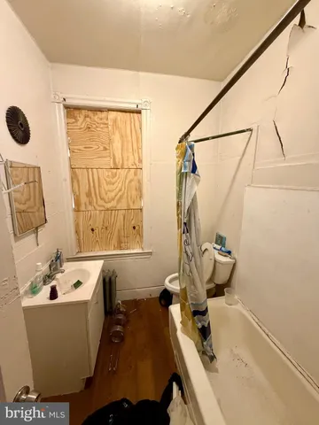 a view of a livingroom with furniture and a rug