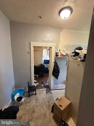 a living room with furniture and a gate