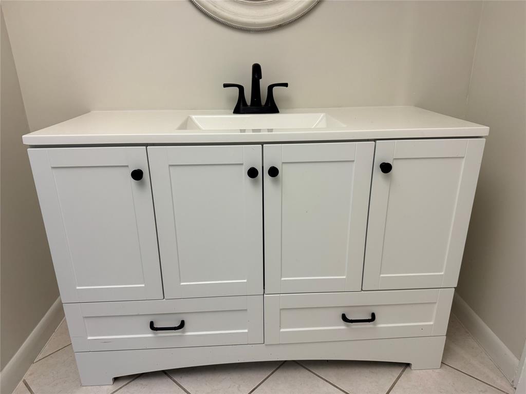 9300 Southwest 8th Street, Unit 215 Boca Raton, FL 33428 - Photo 27 of 43 a bathroom with a shower and mirror