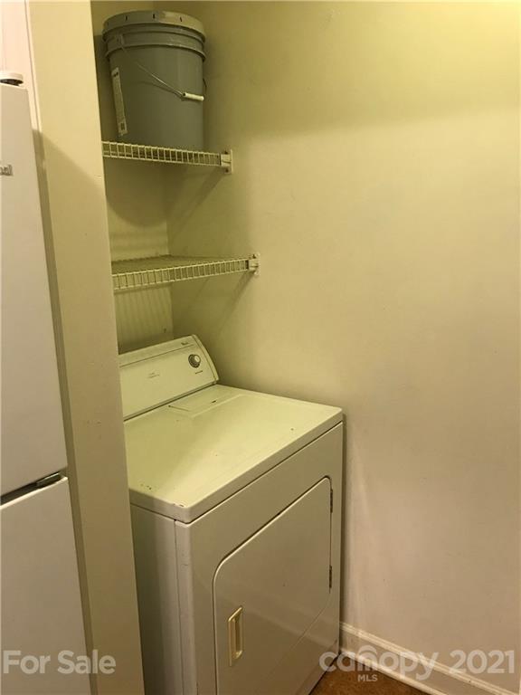 1604 Sharon Road West, Unit 22 Charlotte, NC 28210 - Photo 13 of 23 a utility room with dryer and washer
