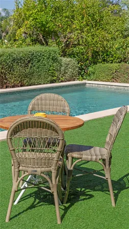 a view of a livingroom with furniture and window