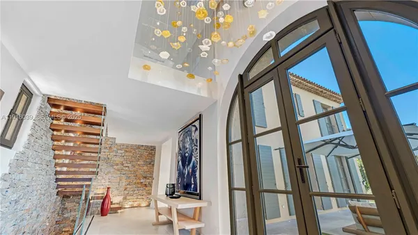 a bathroom with a sink a vanity and a shower