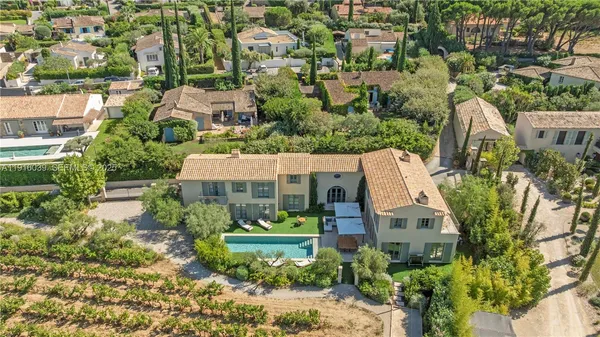 a view of a lake with a house in the background