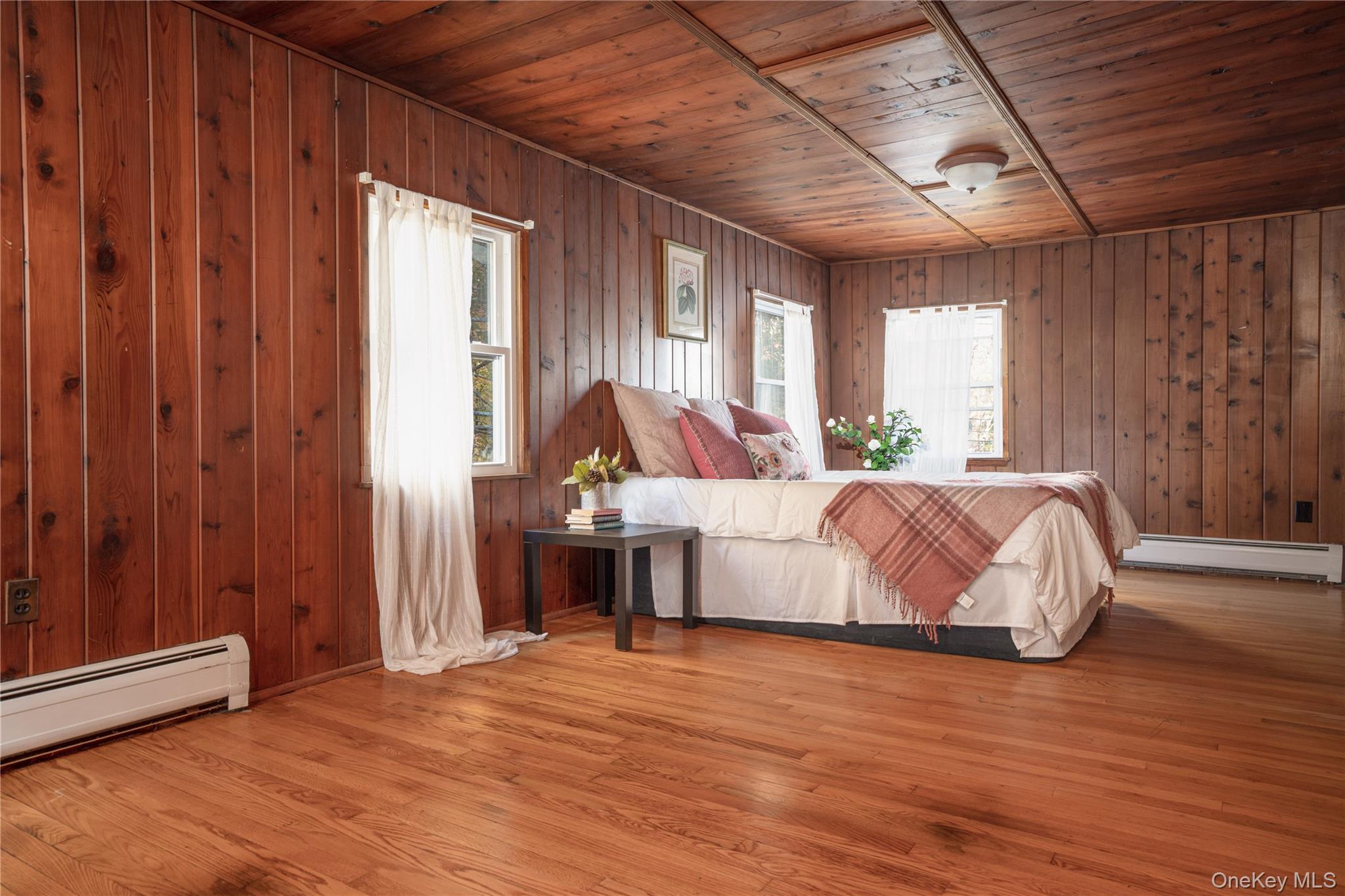 551 South Pascack Road Spring Valley, NY 10977 - Photo 21 of 31 a spacious bedroom with a large bed and a window