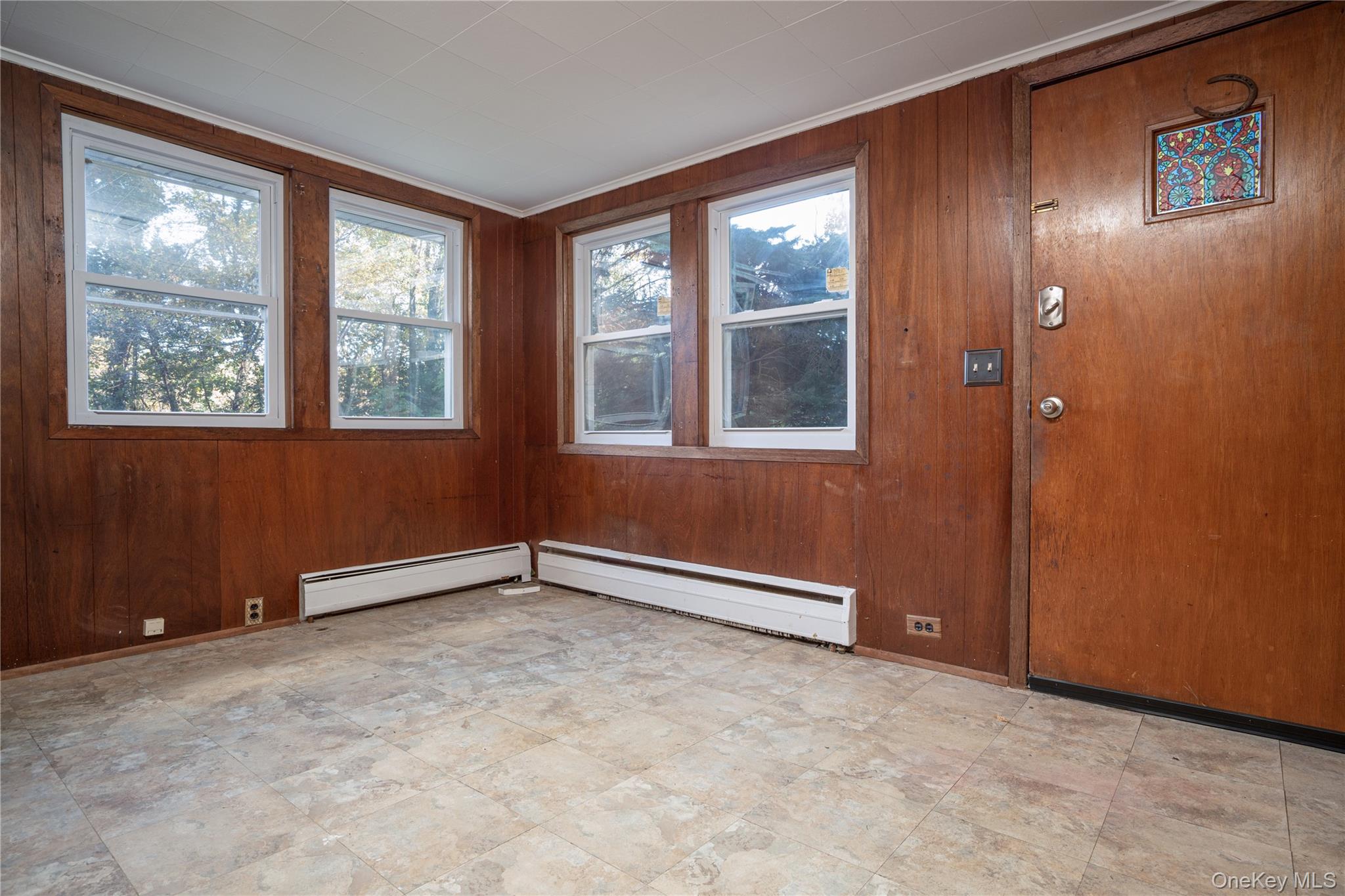551 South Pascack Road Spring Valley, NY 10977 - Photo 5 of 31 an empty room with windows