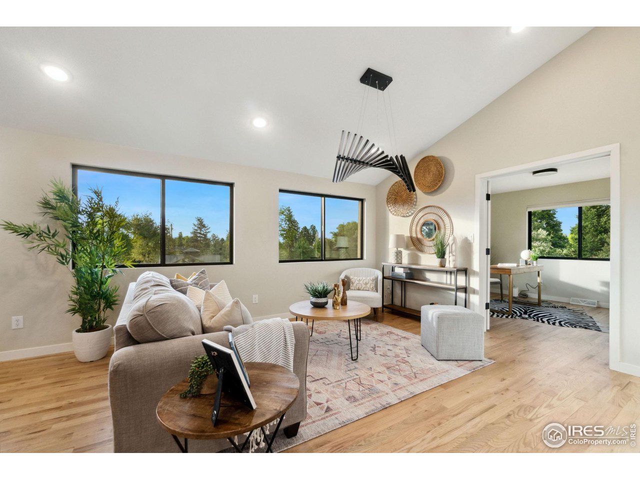 8861 Marathon Road Niwot, CO 80503 - Photo 14 of 40 a living room with furniture and a large window