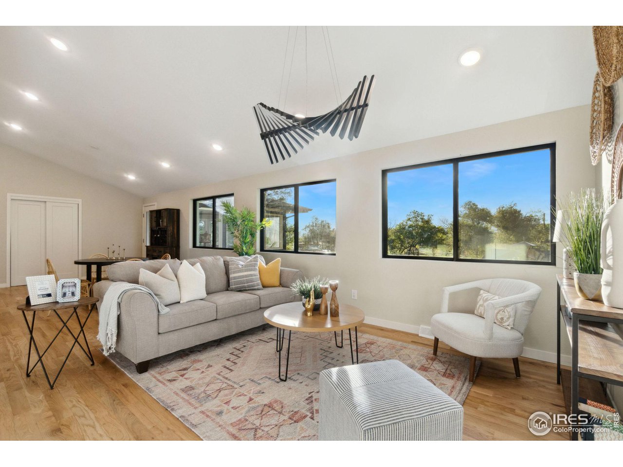8861 Marathon Road Niwot, CO 80503 - Photo 15 of 40 a living room with furniture and a large window
