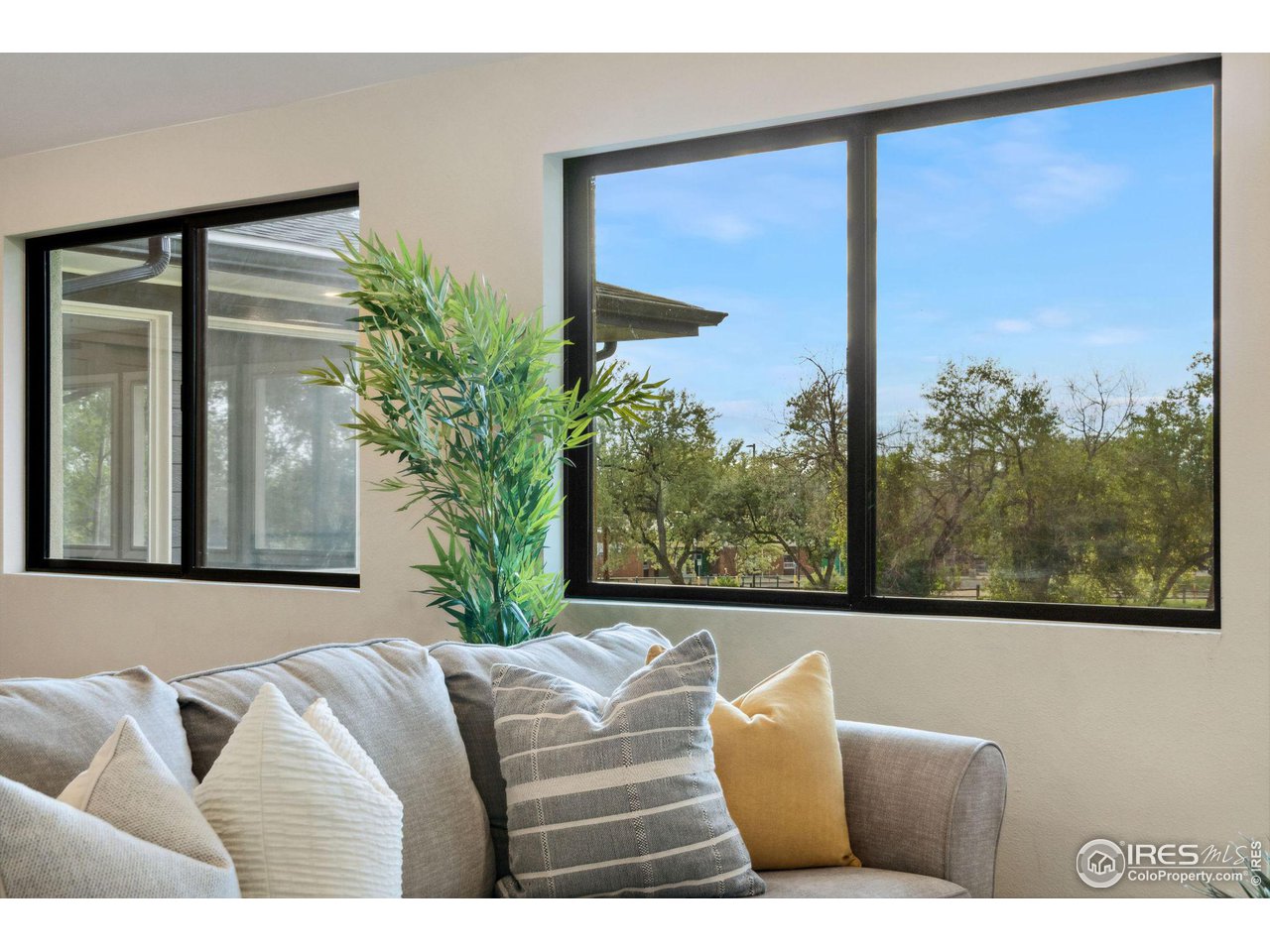 8861 Marathon Road Niwot, CO 80503 - Photo 16 of 40 a bed sitting in a bedroom next to a window