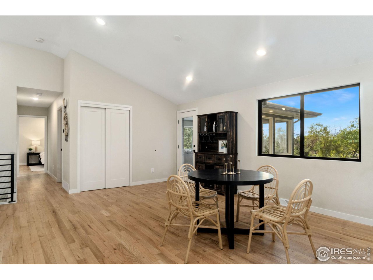8861 Marathon Road Niwot, CO 80503 - Photo 17 of 40 a view of a room with furniture and wooden floor