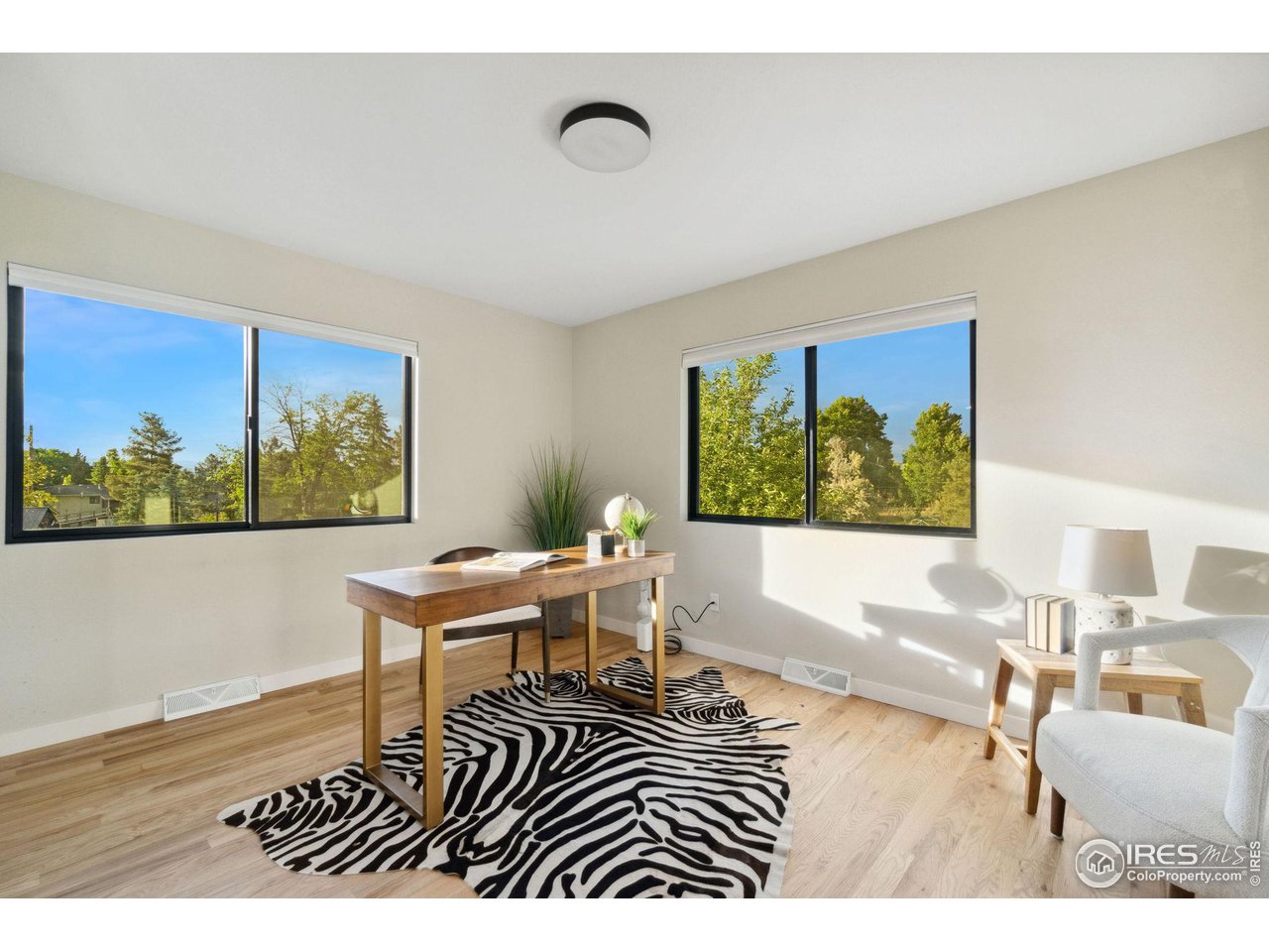 8861 Marathon Road Niwot, CO 80503 - Photo 23 of 40 a living room with furniture and a window