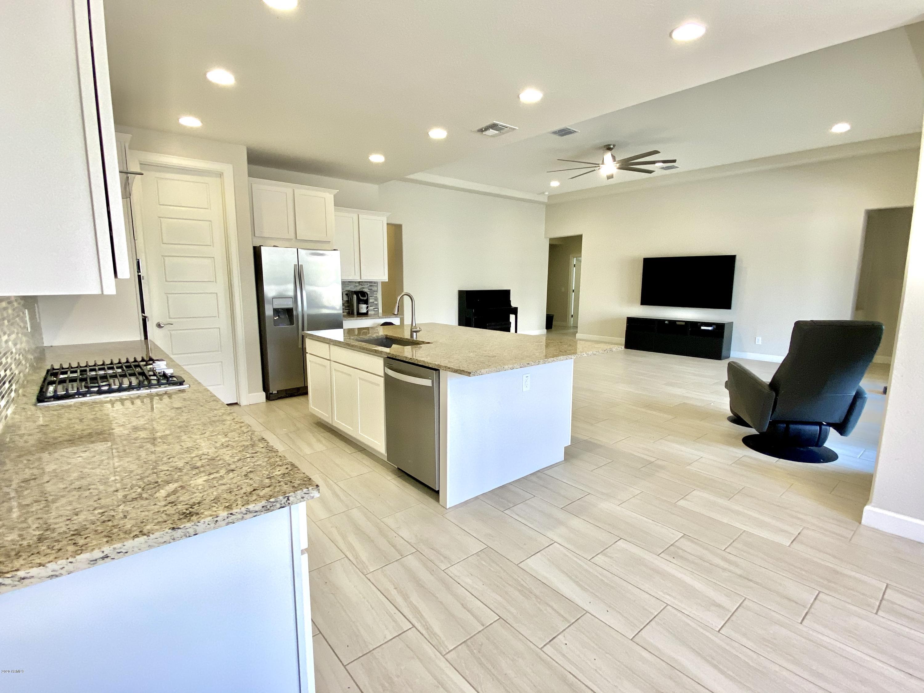 18282 West Raven Road Goodyear, AZ 85338 - Photo 2 of 37 02_KITCHEN_a