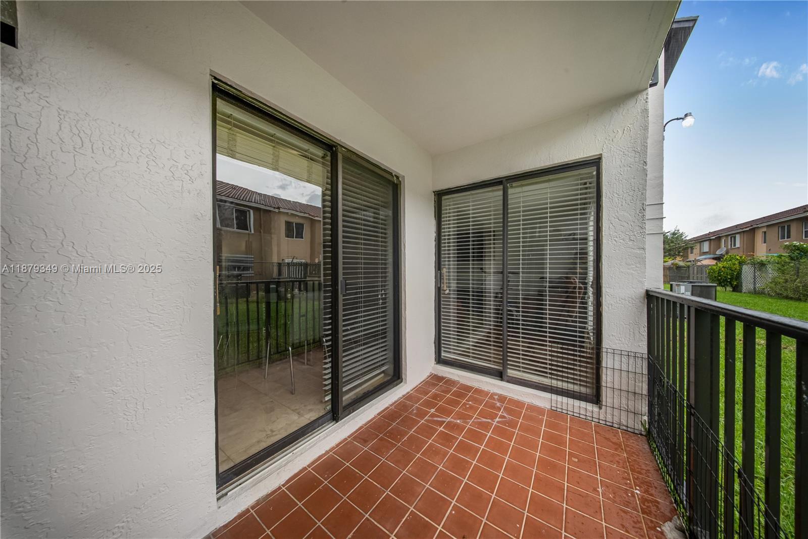 13045 Southwest 68th Street, Unit 103 Miami, FL 33183 - Photo 13 of 13 a bathroom with a glass door shower and a sink