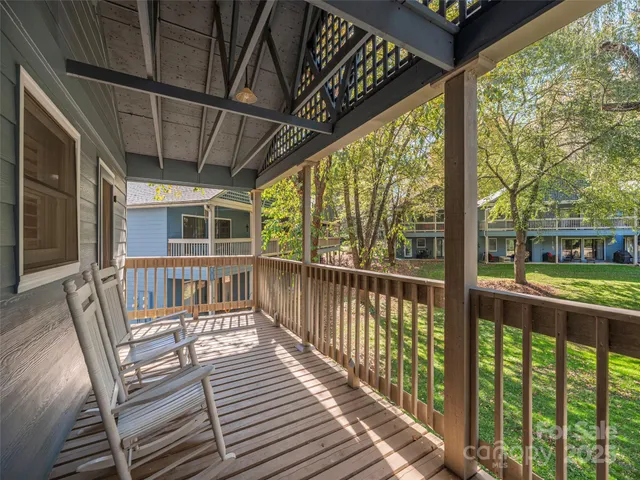 a view of a chairs on the roof deck