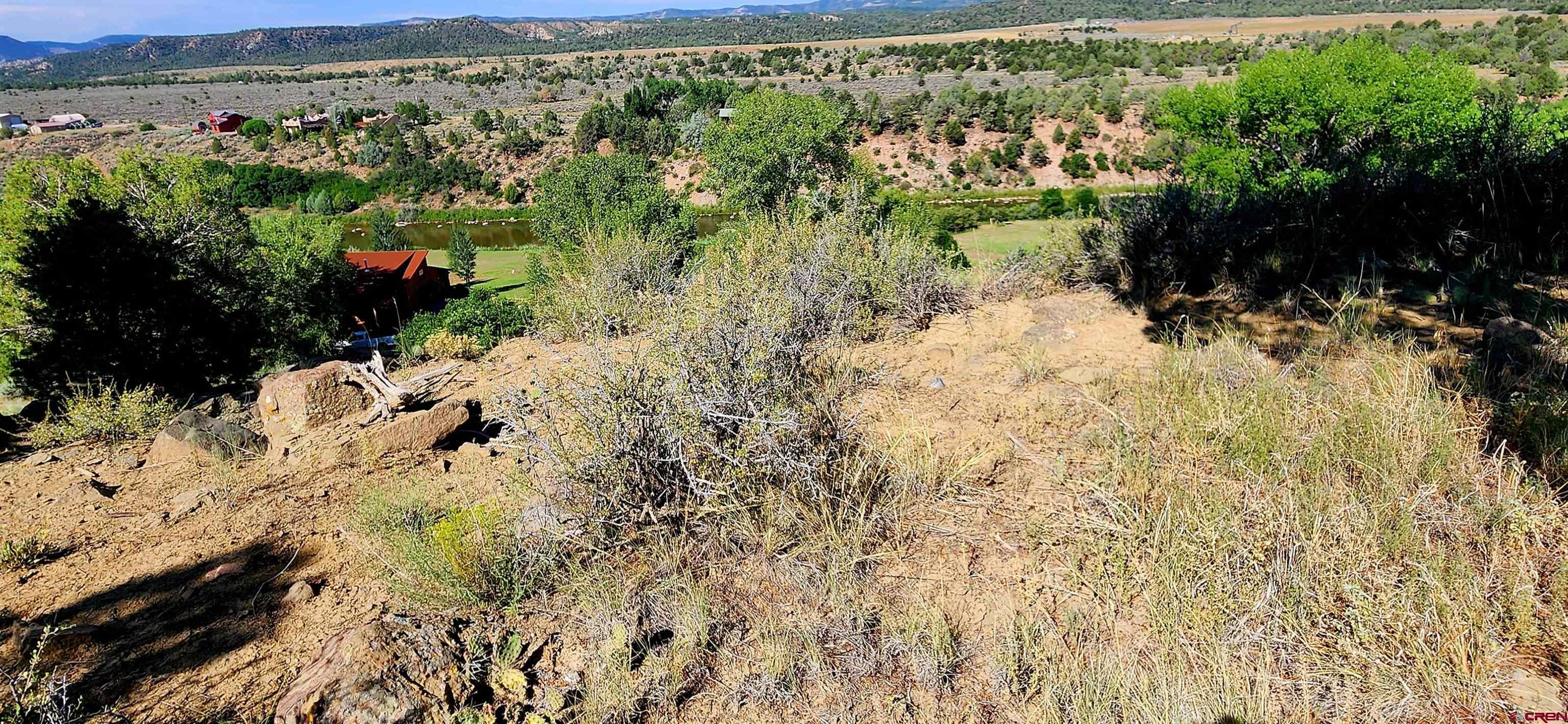 942 Rainbow Road Durango, CO 81303 - Photo 11 of 15 a view of a yard with wooden fence