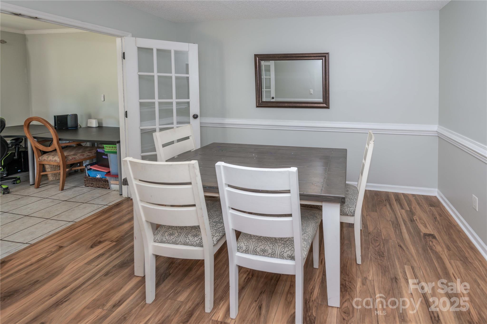 2085 Chapel Creek Road Concord, NC 28025 - Photo 19 of 47 a dining room with furniture and wooden floor