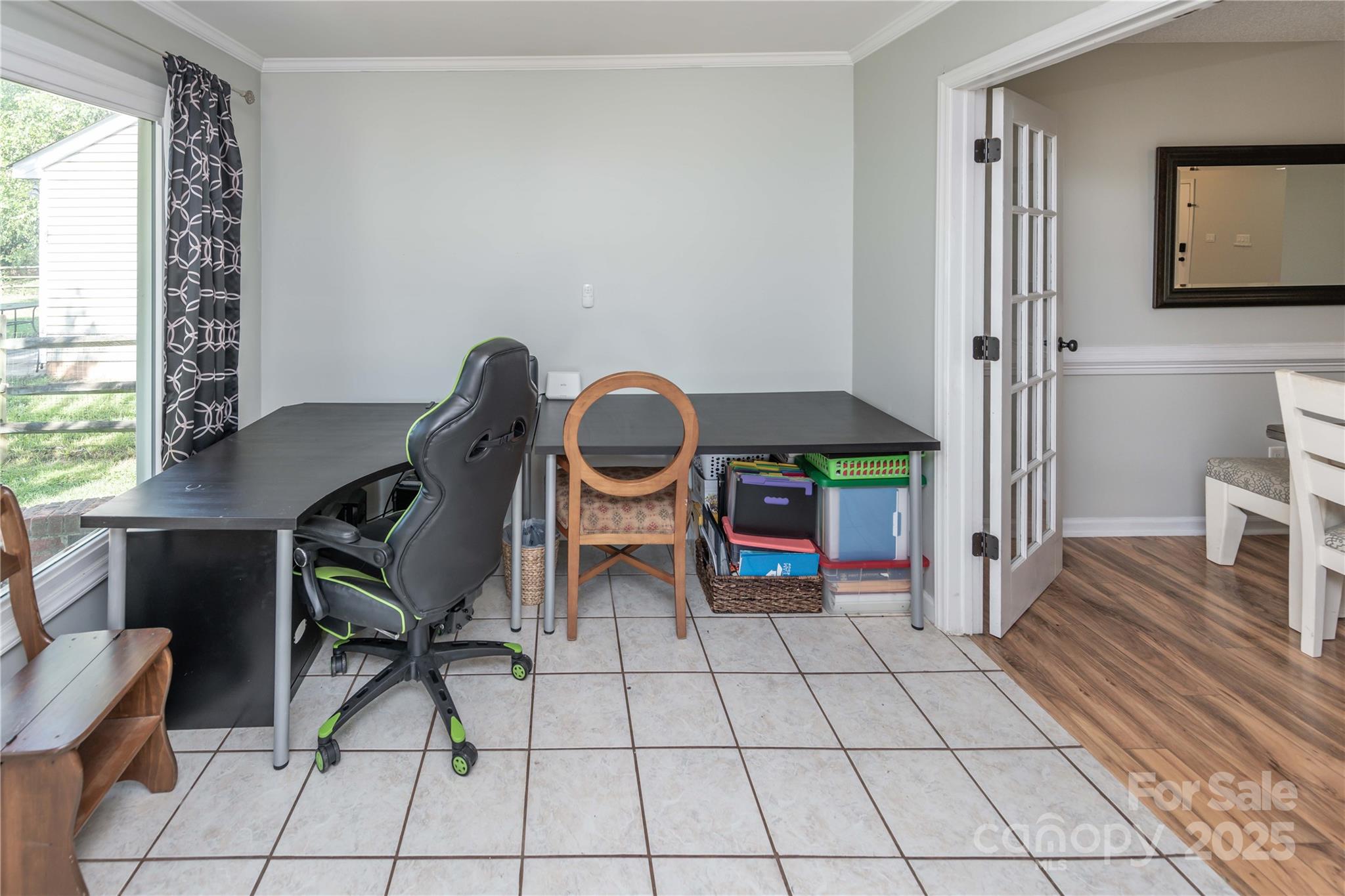2085 Chapel Creek Road Concord, NC 28025 - Photo 23 of 47 a view of a workspace with furniture and a window