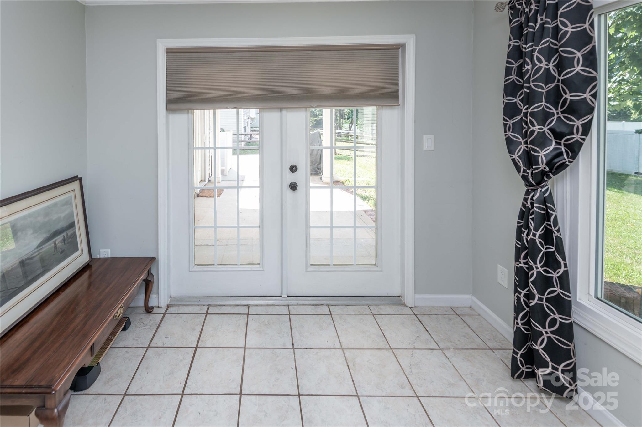 2085 Chapel Creek Road Concord, NC 28025 - Photo 24 of 47 a view of an empty room with a window and fire pit