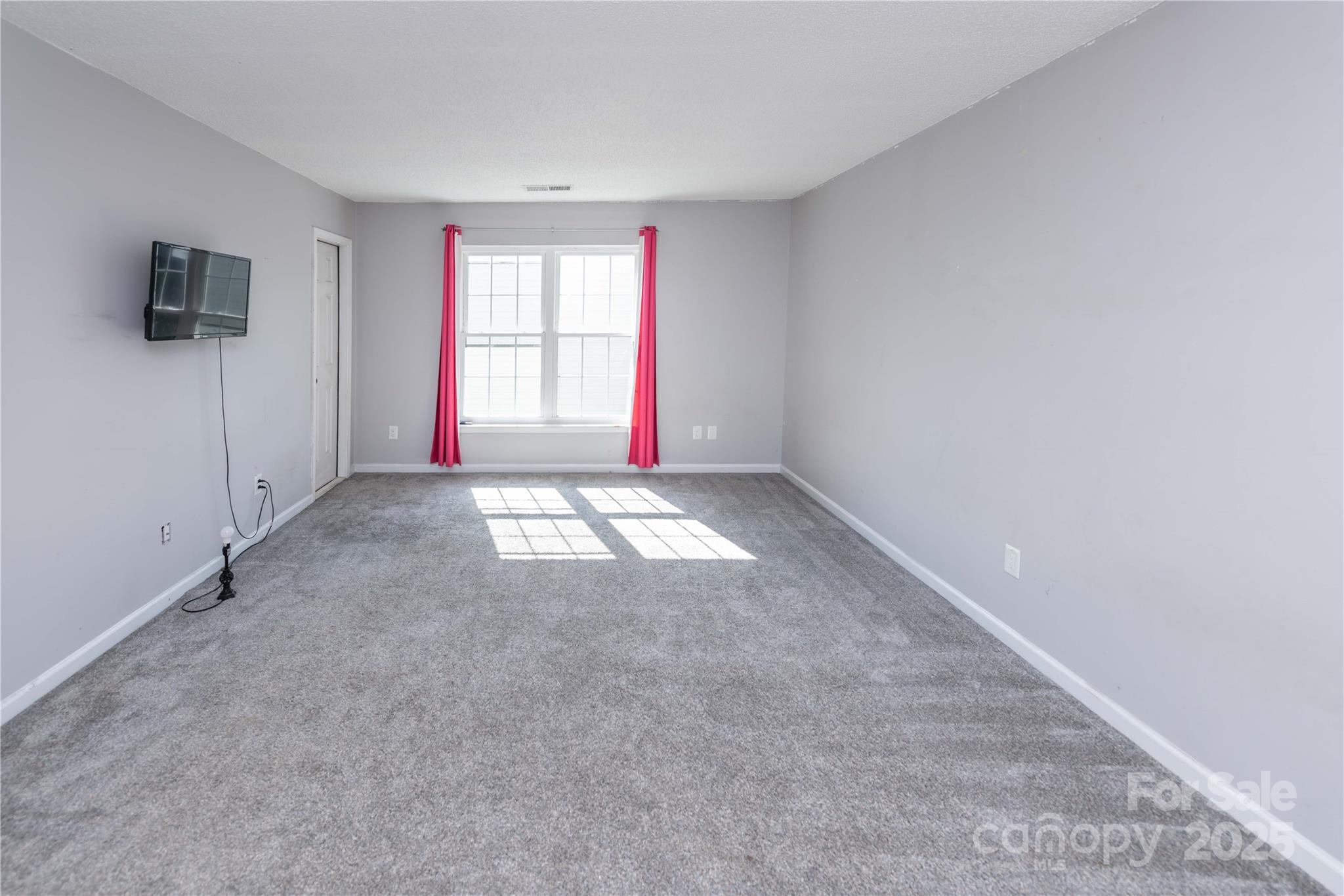 2085 Chapel Creek Road Concord, NC 28025 - Photo 27 of 47 wooden floor in an empty room with a window