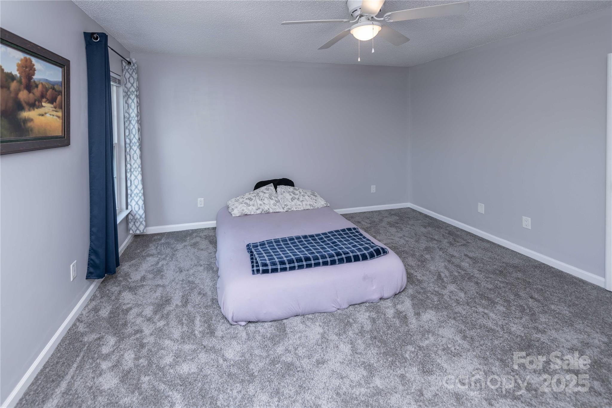 2085 Chapel Creek Road Concord, NC 28025 - Photo 30 of 47 a view of a room with a chandeliers