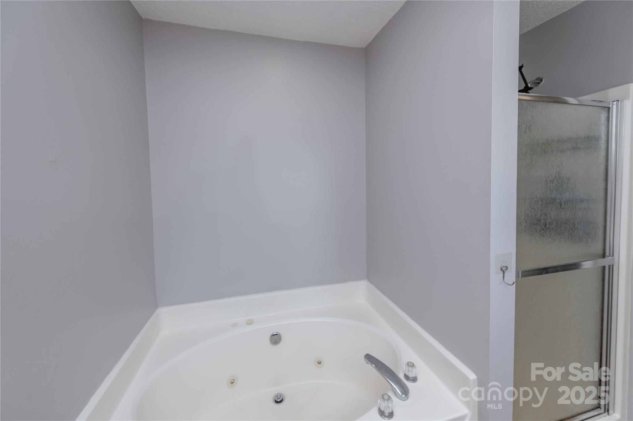 2085 Chapel Creek Road Concord, NC 28025 - Photo 34 of 47 a bathroom with a bathtub