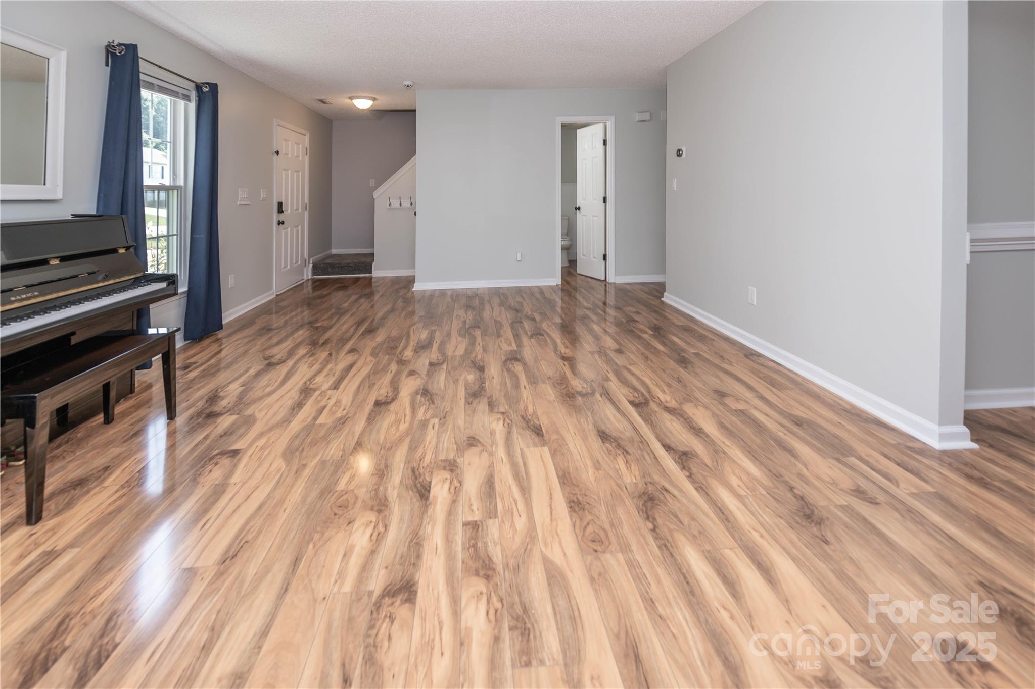 2085 Chapel Creek Road Concord, NC 28025 - Photo 5 of 47 a view of a room with wooden floor