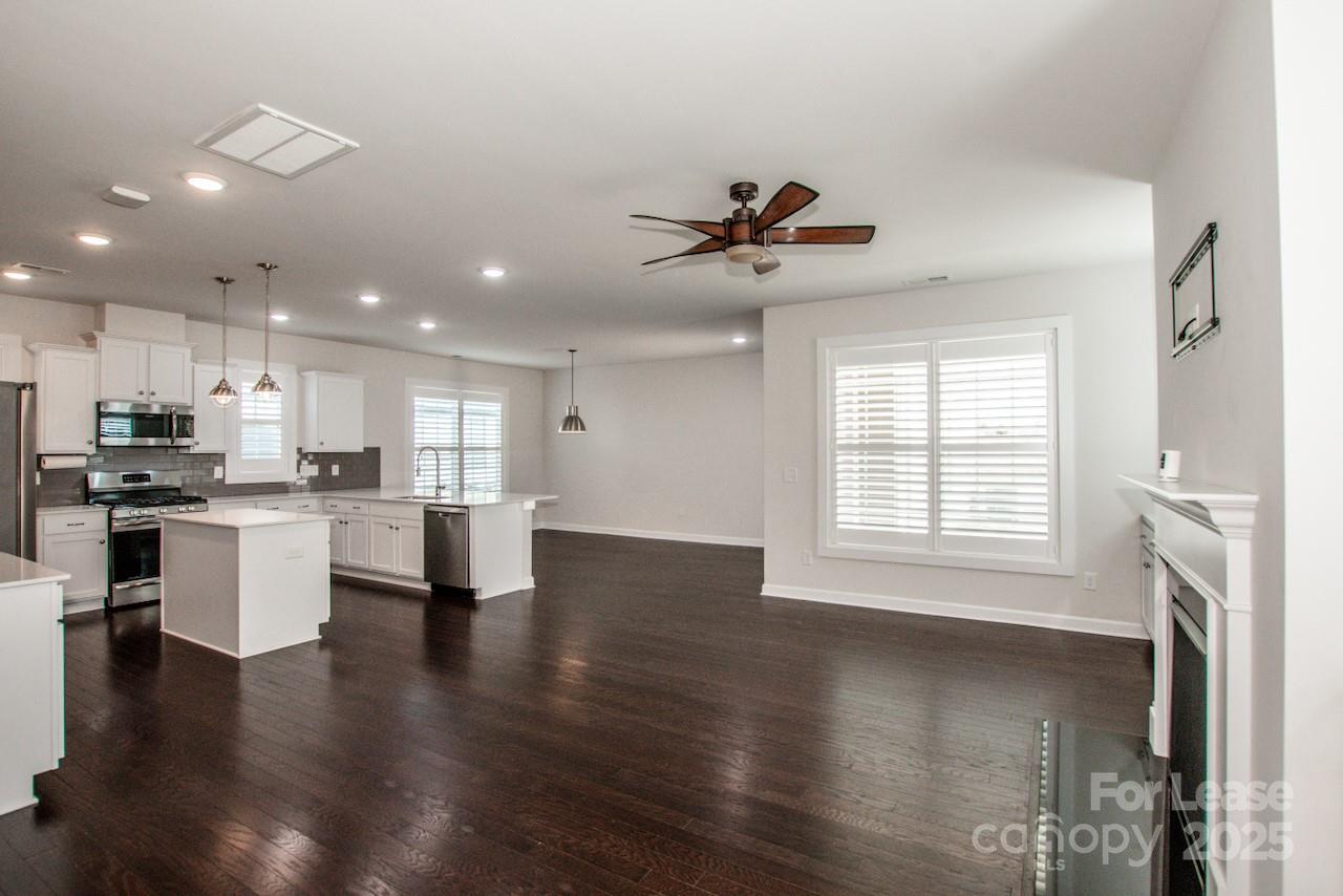 13218 Caite Ridge Road Davidson, NC 28036 - Photo 13 of 48 a view of kitchen with sink microwave and refrigerator
