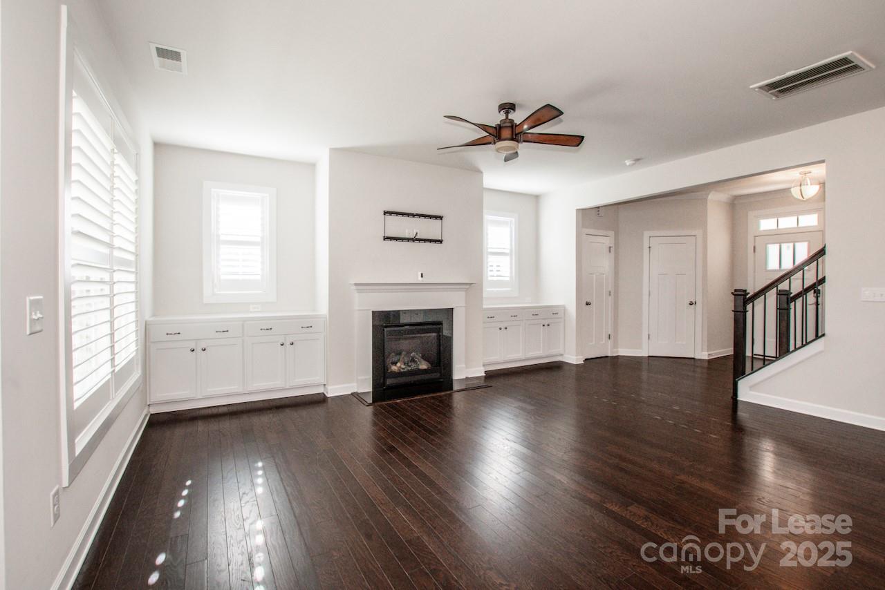 13218 Caite Ridge Road Davidson, NC 28036 - Photo 19 of 48 wooden floor in an empty room with a window