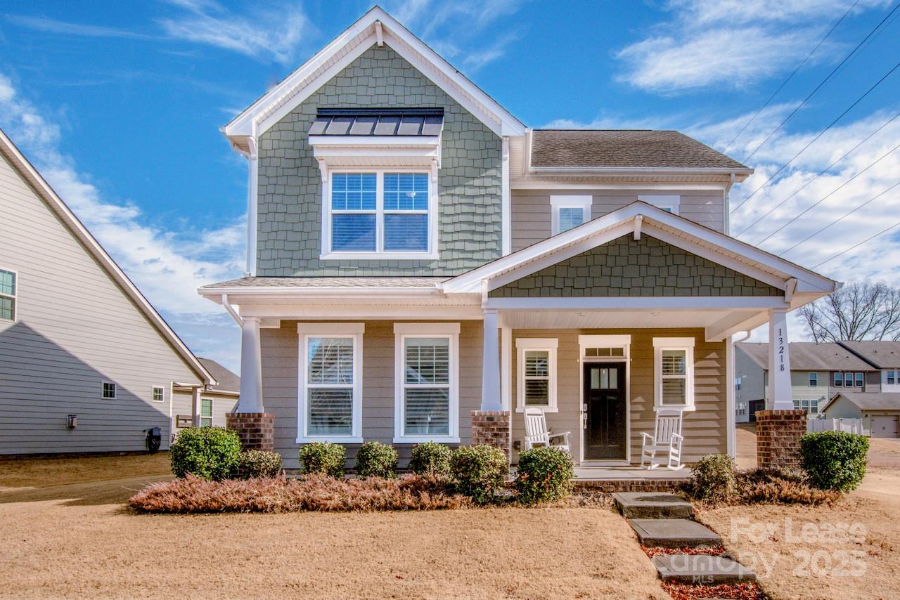 13218 Caite Ridge Road Davidson, NC 28036 - Photo 3 of 48 a front view of a house with garden