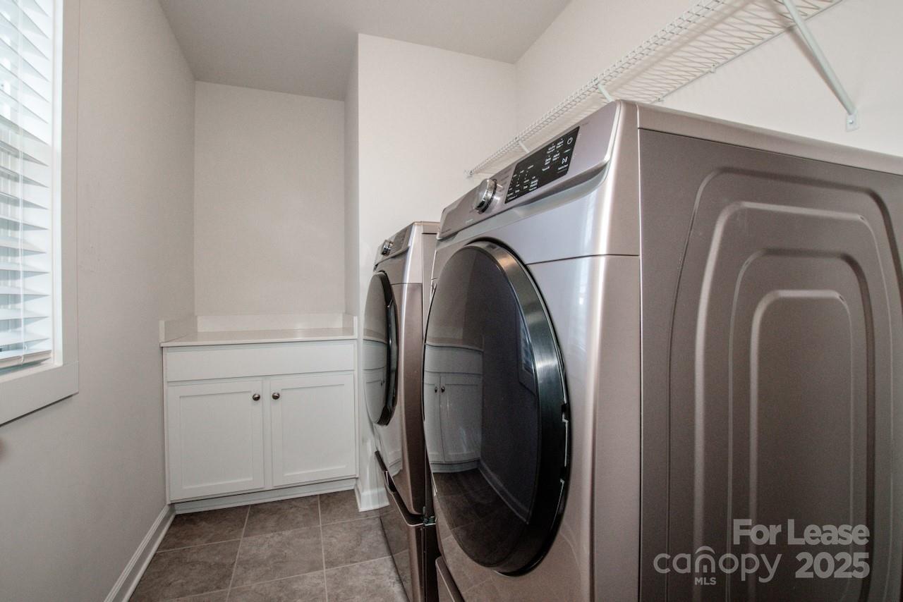 13218 Caite Ridge Road Davidson, NC 28036 - Photo 35 of 48 a utility room with dryer and washer